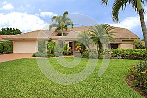 Florida clean ranch style home with roof hole to accomodate palm tree