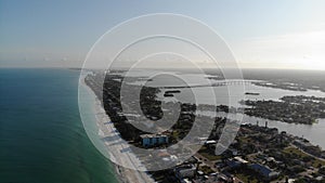Florida clear blue water birds eye view - Floridian sandy beaches drone. city â€‹â€‹on the beach Aerial view of Indian Rocks Beach