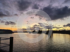 Florida fishing pier sunset clouds water gulf