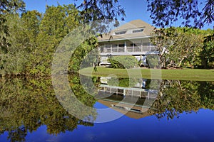 Florida home with private pond reflection