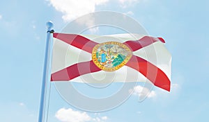 Florida USA flag waving against blue sky