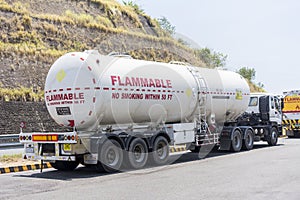 Floridablanca, Pampanga, Philippines - A tanker or fuel truck is parked by a rest stop at a highway