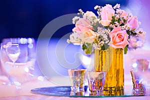 Florist decor in  indoor wedding setup table