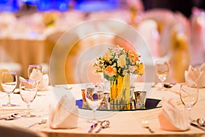 Florist decor in  indoor wedding setup table