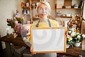 Florist Holding Sign