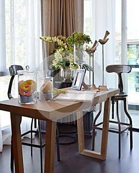 Florist at home. flowers and accessories on wooden table