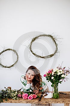 Florist makes a bouquet. photo