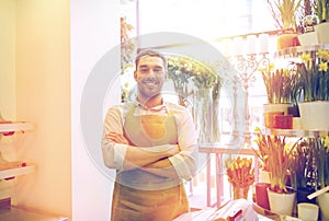 Florist man or seller at flower shop counter