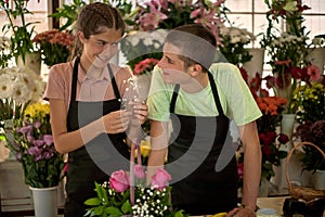 Florists decorate flower arrangements