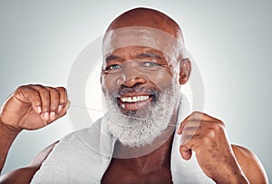 Floss, portrait and teeth of man isolated on white background for senior mouth, self care smile and cleaning. African