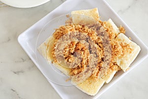 Flossed pork bread on a plate