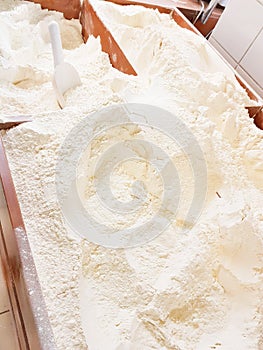 Flour in boxes on the counter in the supermarket. food background