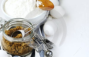 Flour, brown sugar and eggs for baking