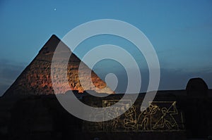 flour country with egyptian gods , pyramid at night image