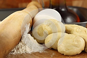 Flour dough with rolling pin