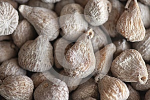 Flour-dusted dried figs originating from Spain, delicious produce of Ficus carica tree, healthy and nutritious snack