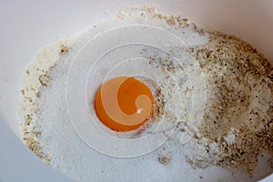Flour and egg in bowl