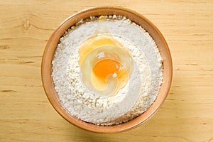 Flour and egg in bowl