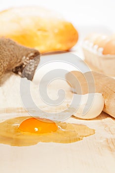 Flour, egg on kitchen table