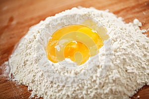 Flour and eggs as ingredients for making pasta dough