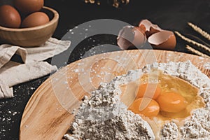 Flour and eggs as ingredients for making pasta dough