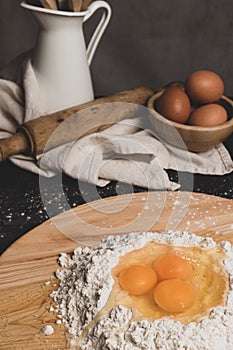 Flour and eggs as ingredients for making pasta dough