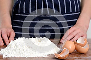 Flour hands eggs raw ingredients