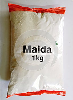 Flour or Maida one kilogram or kg in transparent packet for sale photo