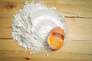 Flour and an open egg