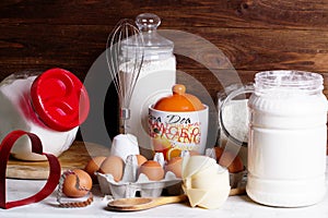 Flour and other kitchen utensils. The concept of simple healthy