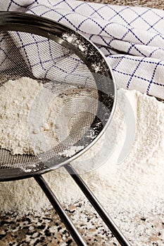 Flour is sieved before baking with a sieve