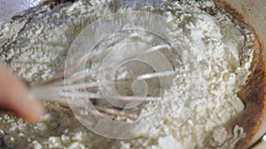 Flour sifted into a glass bowl.