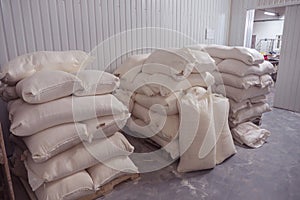 Flour, sugar in bags in a warehouse
