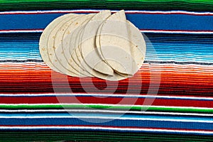 Flour tortillas on Mexican blanket