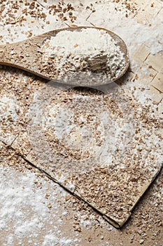 Flour on a wood spoon