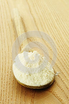 Flour on a wooden chopping board