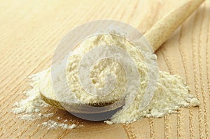 Flour on a wooden chopping board