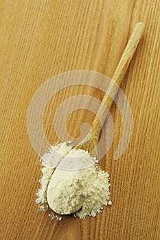 Flour on a wooden chopping board