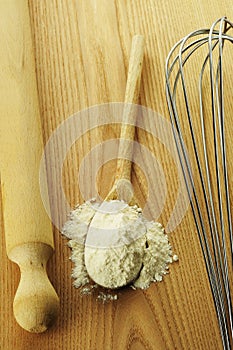 Flour on a wooden chopping board