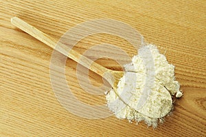 Flour on a wooden chopping board