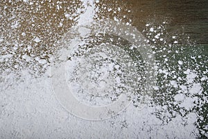 Flour on wooden table