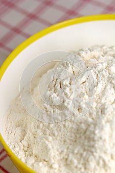 Flour in yellow bowl