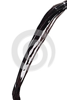 Flow of Crude Oil gasoline pour down over white background isolated. Black water liquid fall down line. Black Ink, Coffee drink