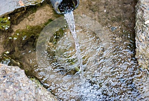 Flow of natural spring water