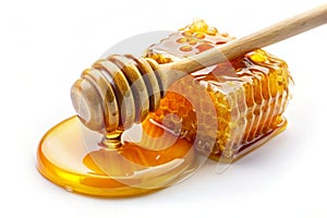 Flow of sweet honey on the white background. Isolated photo