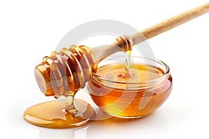 Flow of sweet honey on the white background. Isolated photo