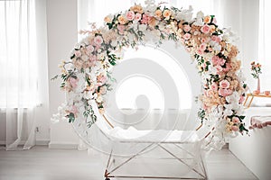 Flower arch, decoration. Light room.