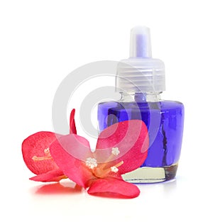 Flower with aromatherapy essential oil blue glass dropper bottle