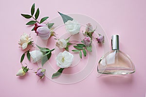 Flower arrangement. Flowers, fragrance, perfume on pink background