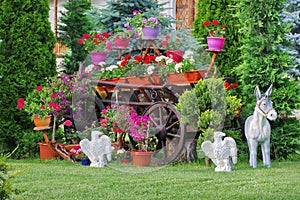 Flower arrangement in the garden of Monastery Bujoreni, landmark attraction in Romania. Spring landscape